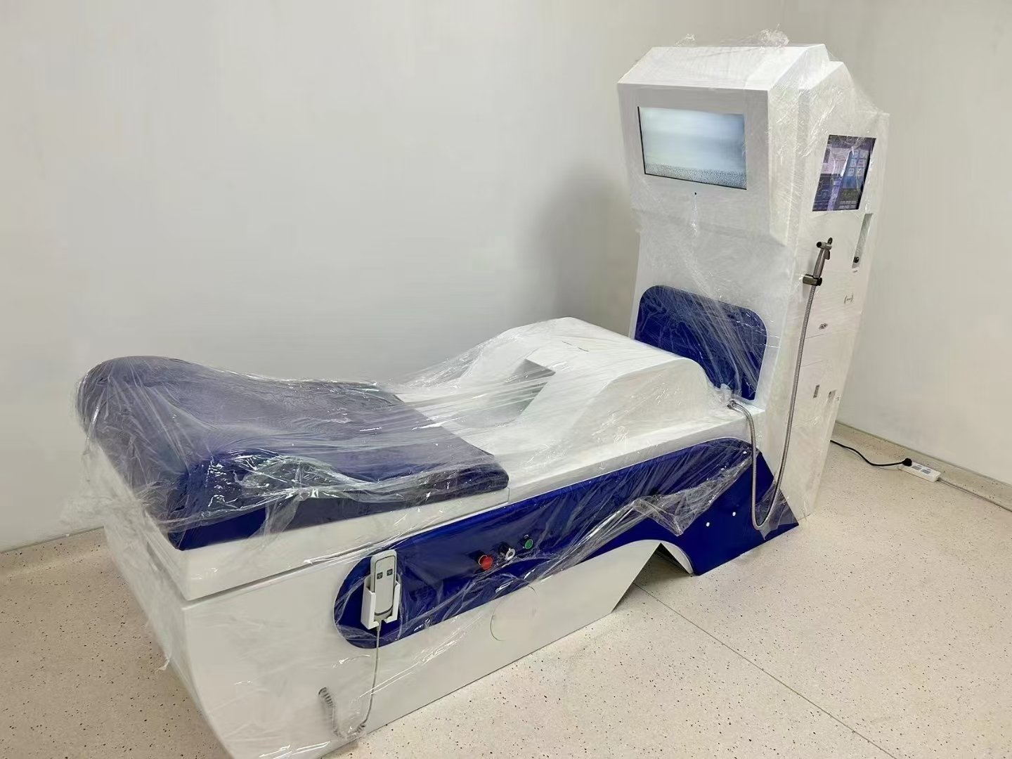 Modern colon hydrotherapy treatment room in UK wellness clinic