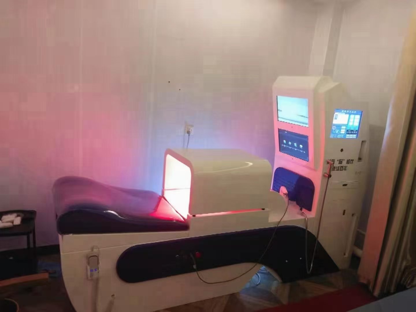 Professional colon hydrotherapy treatment room with modern equipment