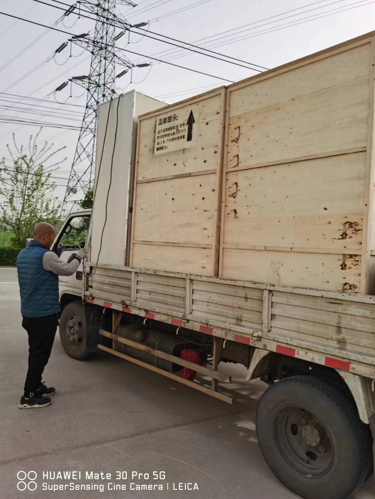Multiple colonic machines loaded in shipping container